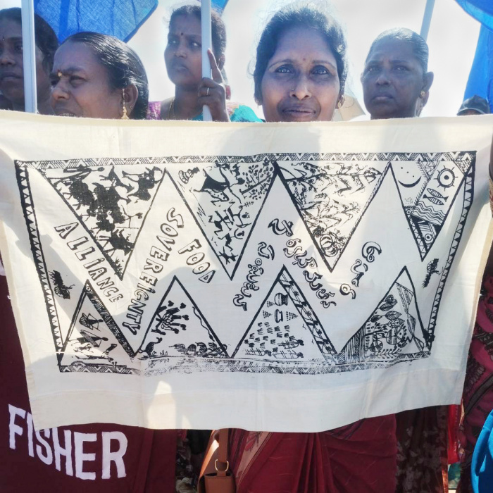 Indian fisherwoman with banner